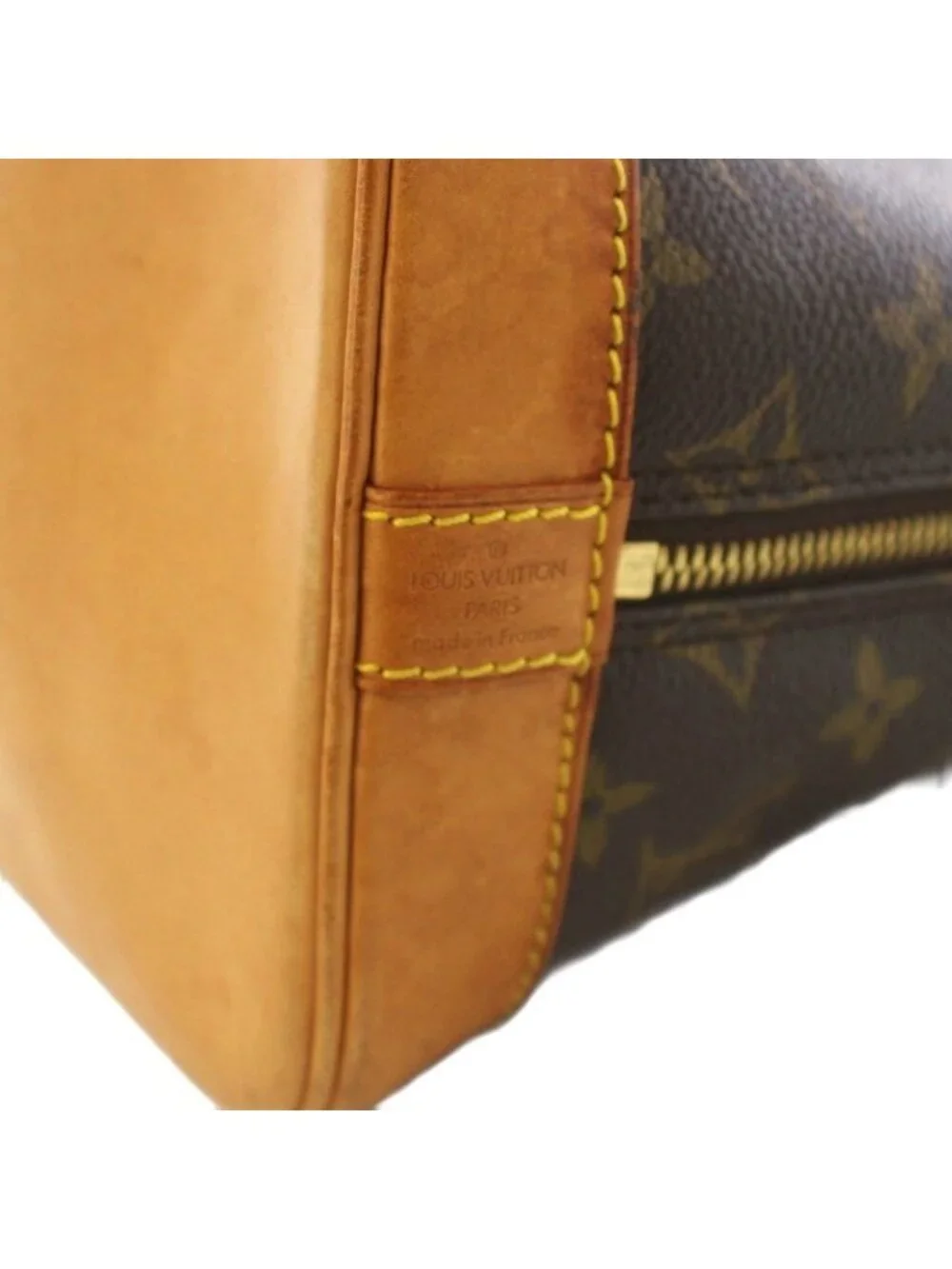 Louis Vuitton Alma Monogram Handbag